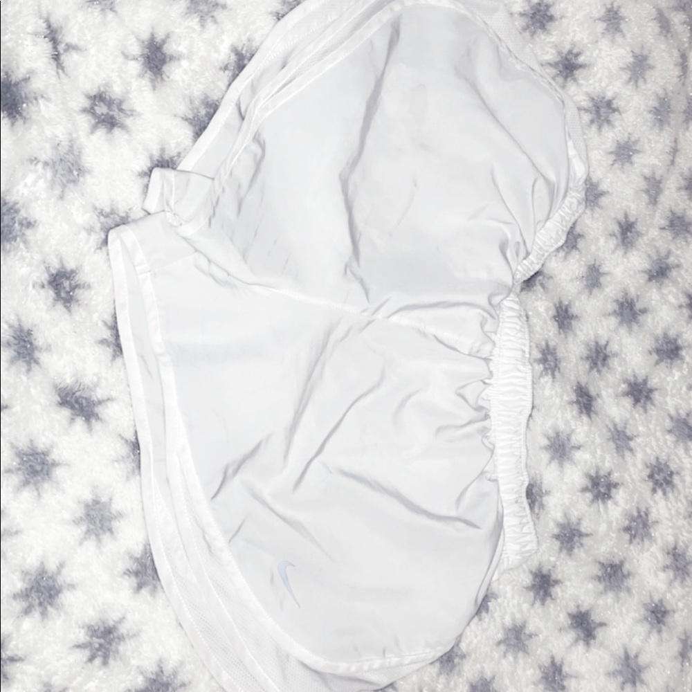 White Nike shorts